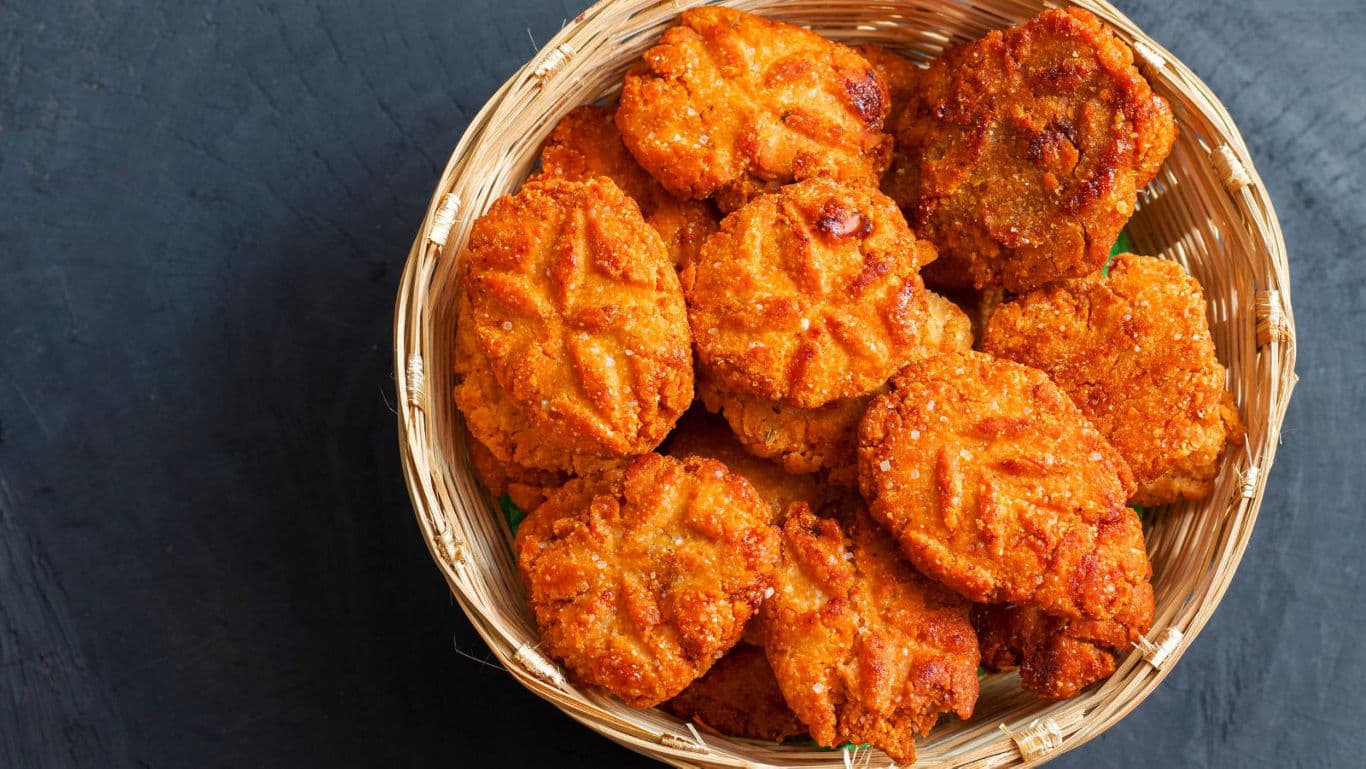 Crispy fried snacks in woven basket