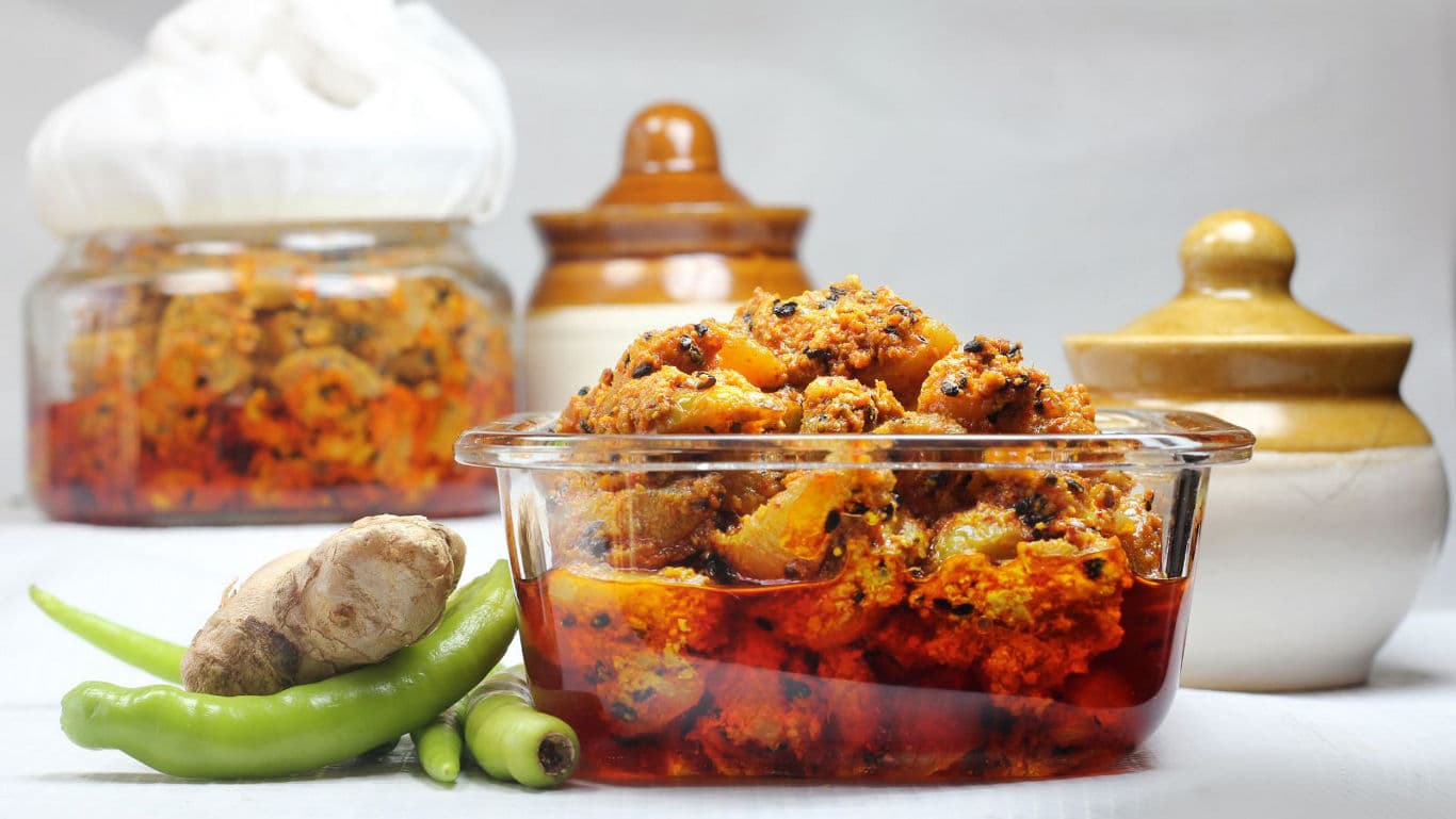 Indian Mango Pickle in Glass Bowl with Spices
