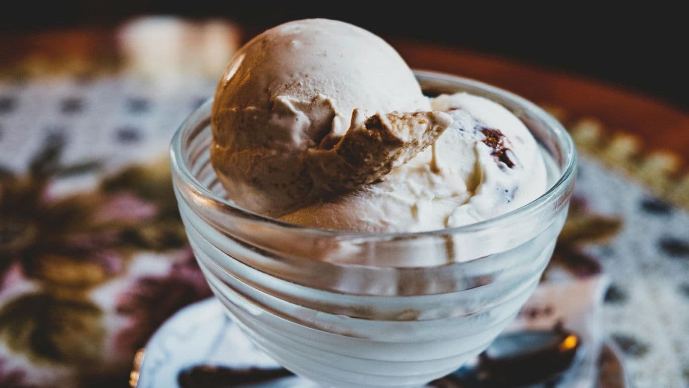 Vanilla Ice Cream Scoops in Glass Dessert Bowl