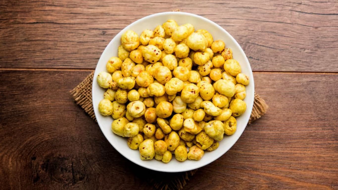Bowl of Roasted Makhana on Wooden Table