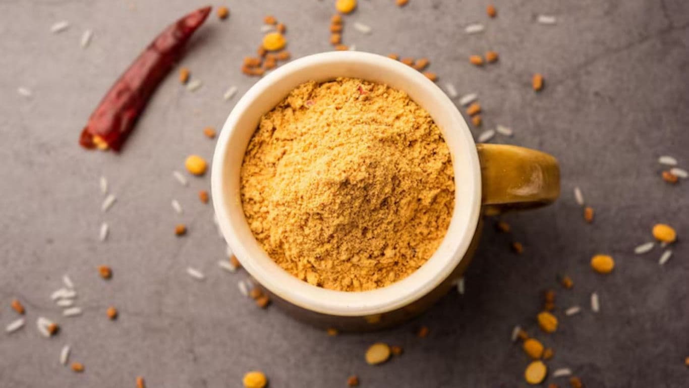 Yellow Spice Powder in Ceramic Mug with Lentils