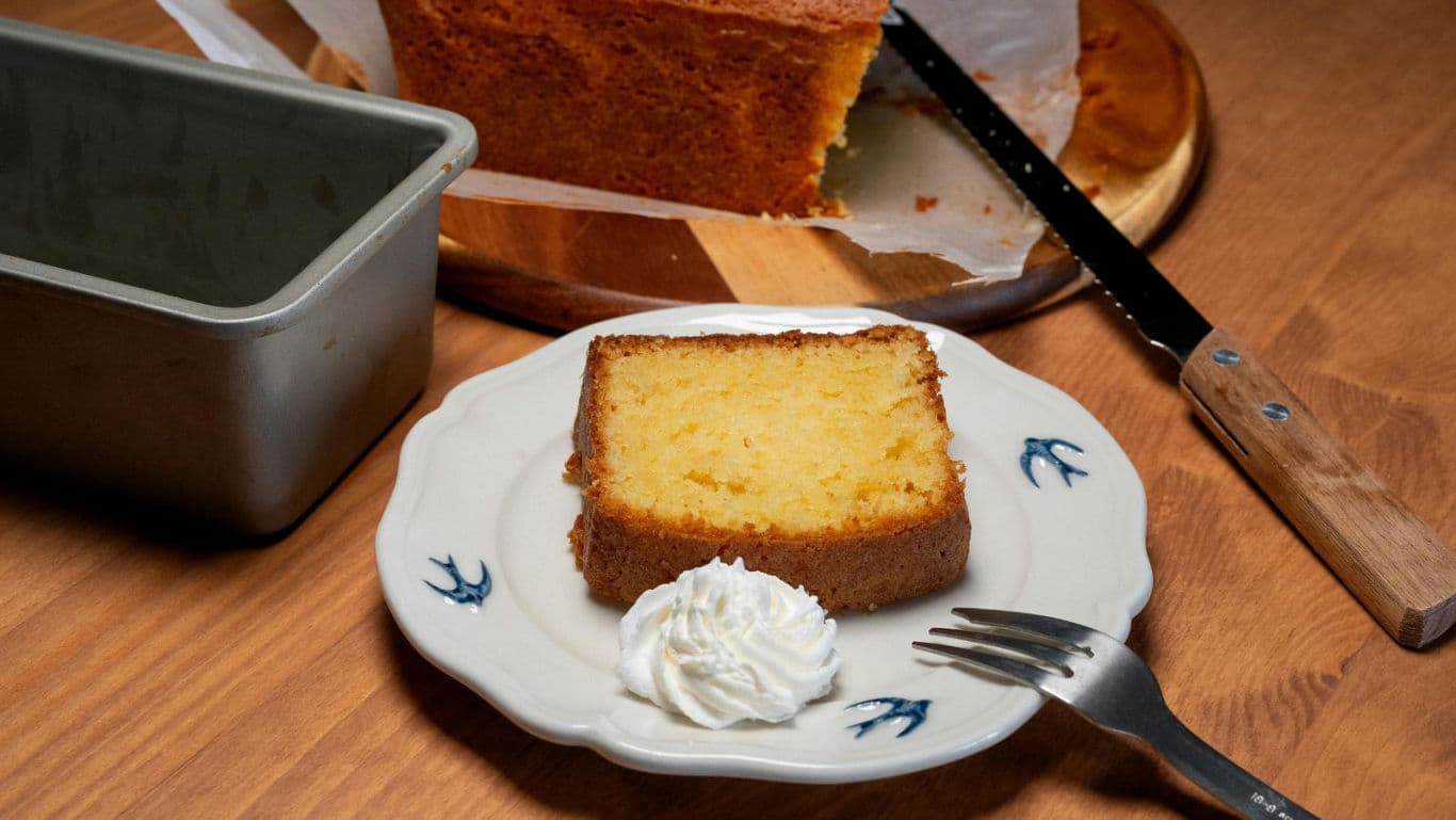 Slice of pound cake with whipped cream