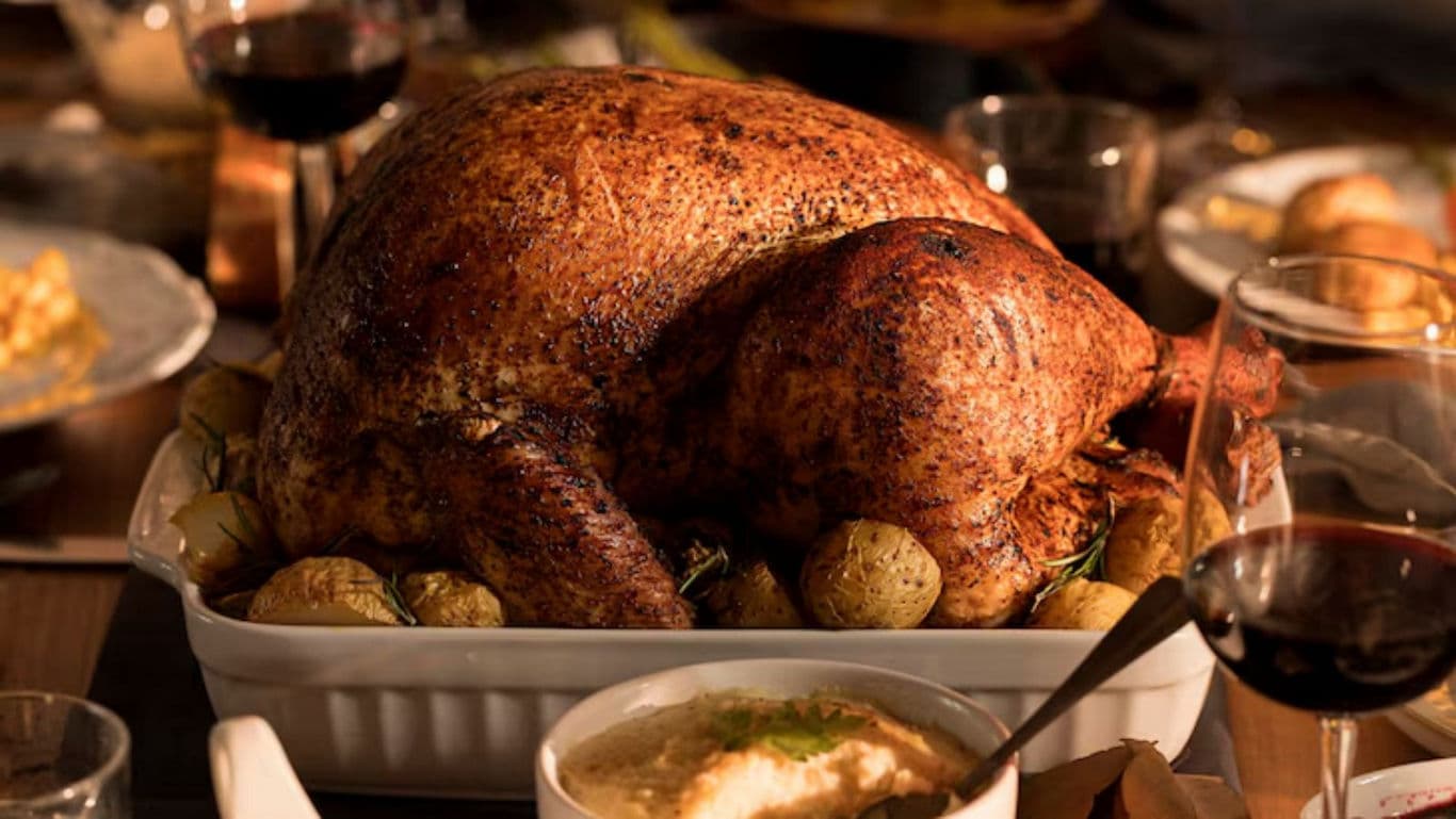 Golden roasted turkey with potatoes