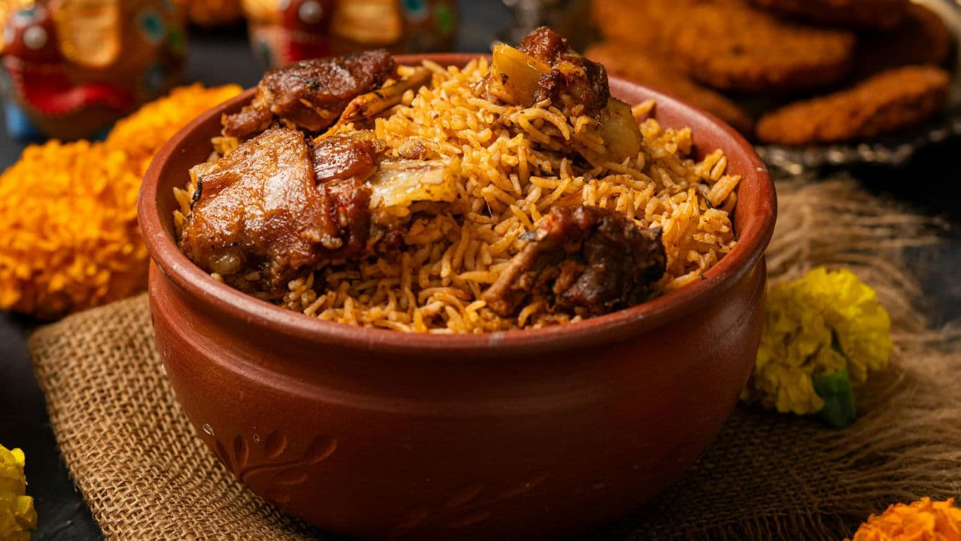 Traditional mutton biryani in clay pot