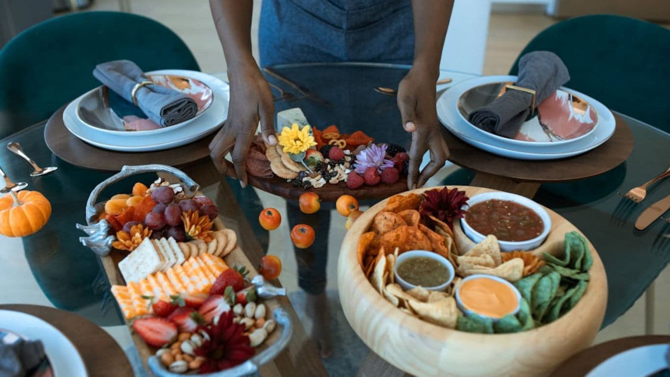 Festive autumn table with assorted appetizers and dips