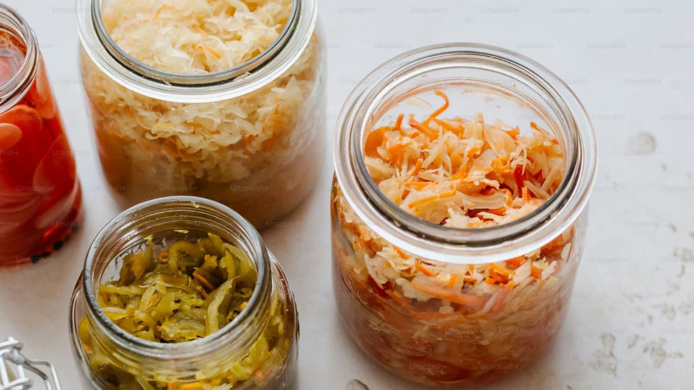 Assorted homemade fermented vegetables in jars