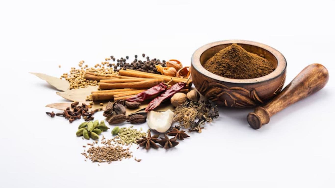 Assorted Spices with Wooden Grinder