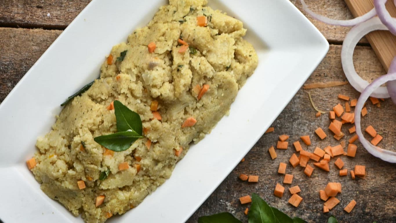 Traditional Upma Served on White Rectangular Plate