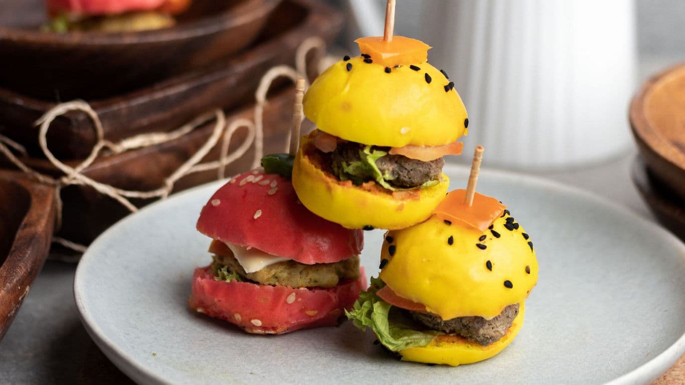 Colorful mini sliders on rustic plate