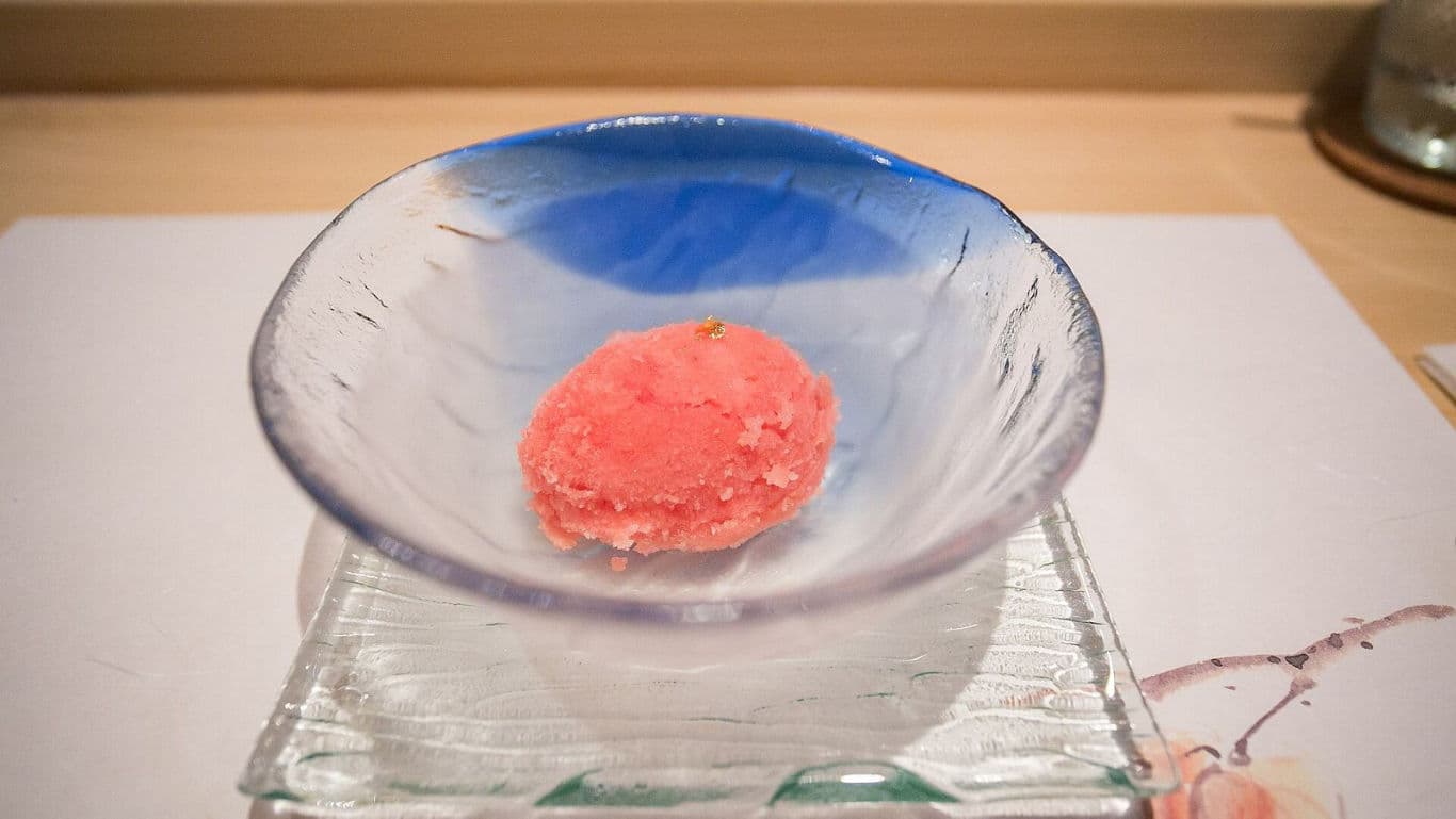 Single Scoop of Pink Sorbet in Glass Bowl