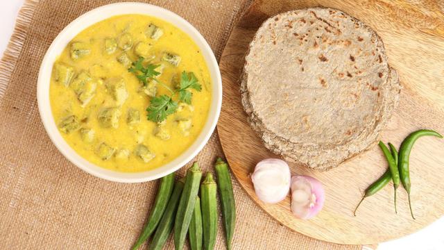Dahi Bhindi served in a traditional bowl with curd-based gravy and okra pieces