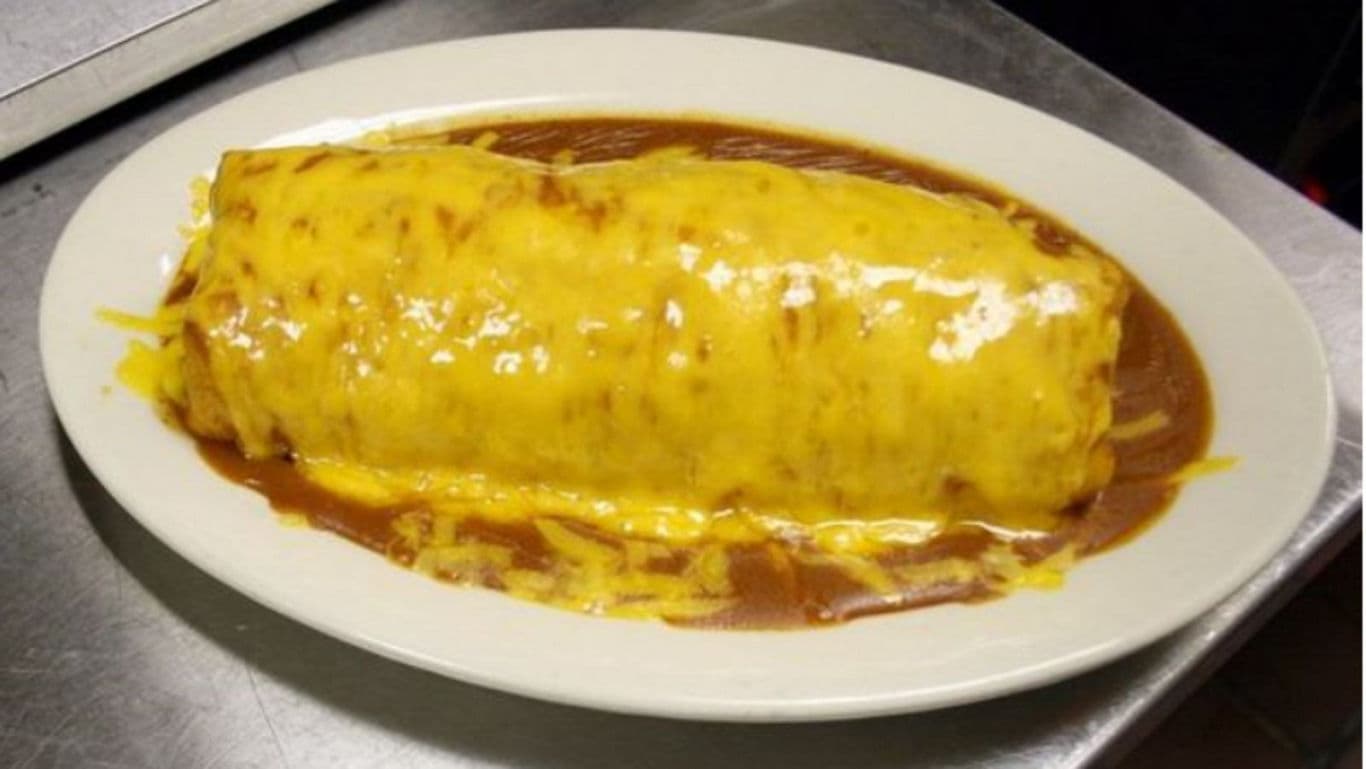 Cheese Smothered Burrito on White Plate