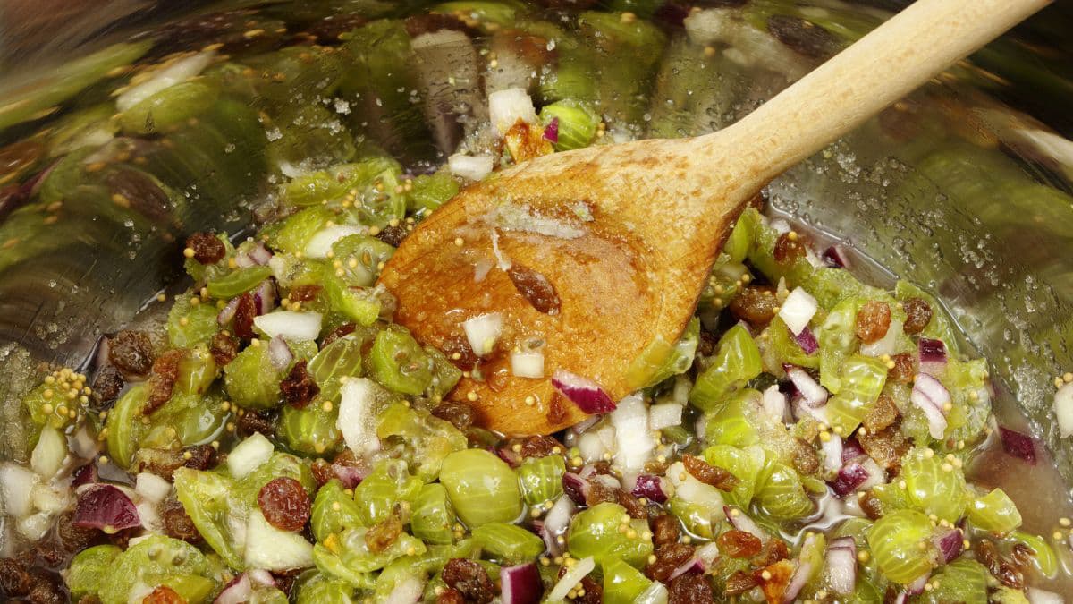 chopped amla being cooked