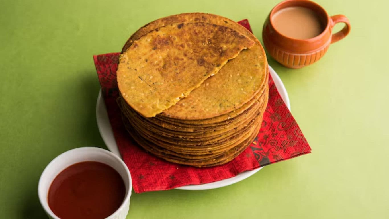 Stack of Indian Masala Khakhra with Tea and Chutney