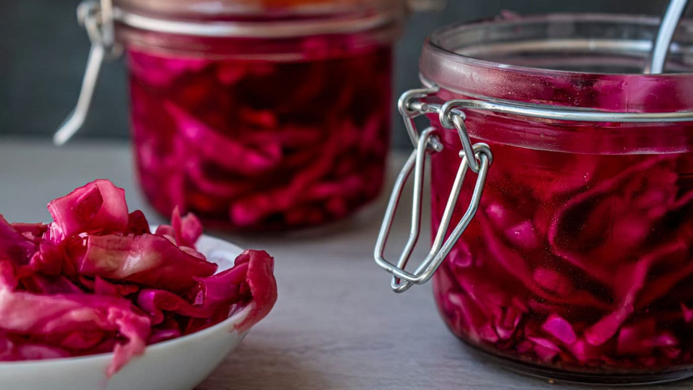 Homemade pickled red cabbage in glass jars