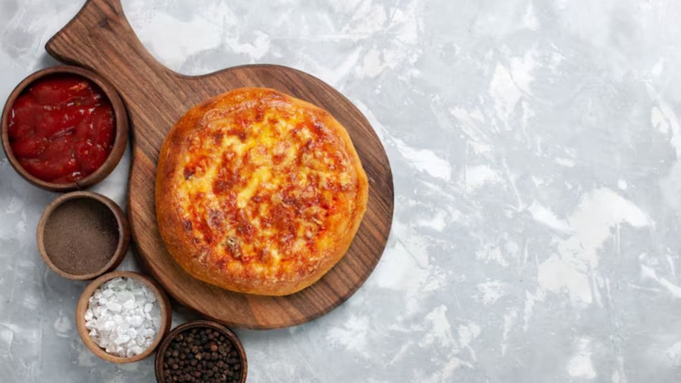 Cheese Pizza on Wooden Board with Seasonings
