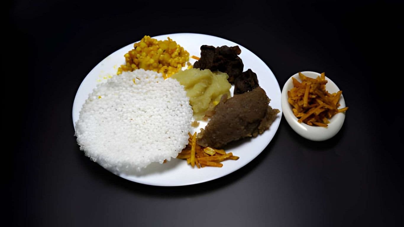 Traditional Indian meal with rice, lentils, and vegetables