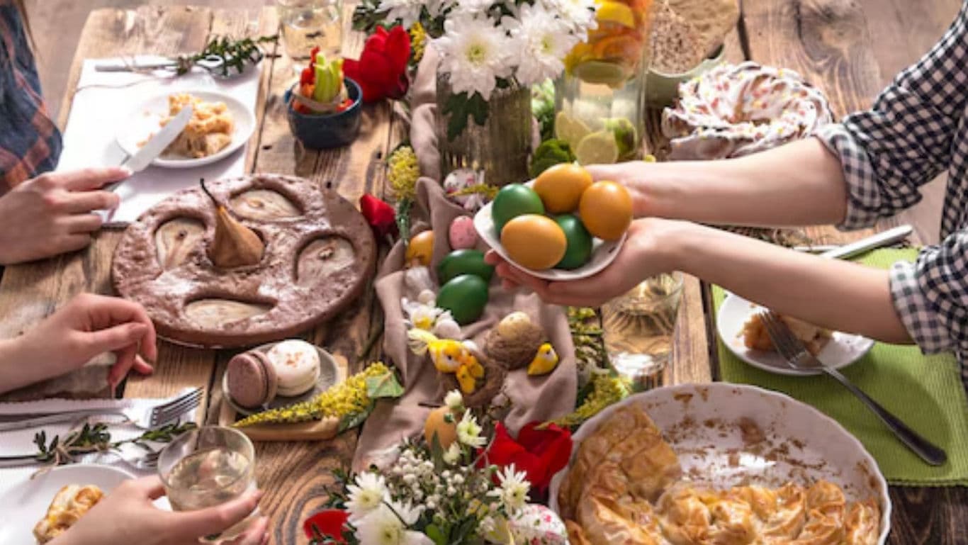 Festive Spring Table with Colored Eggs and Pastries