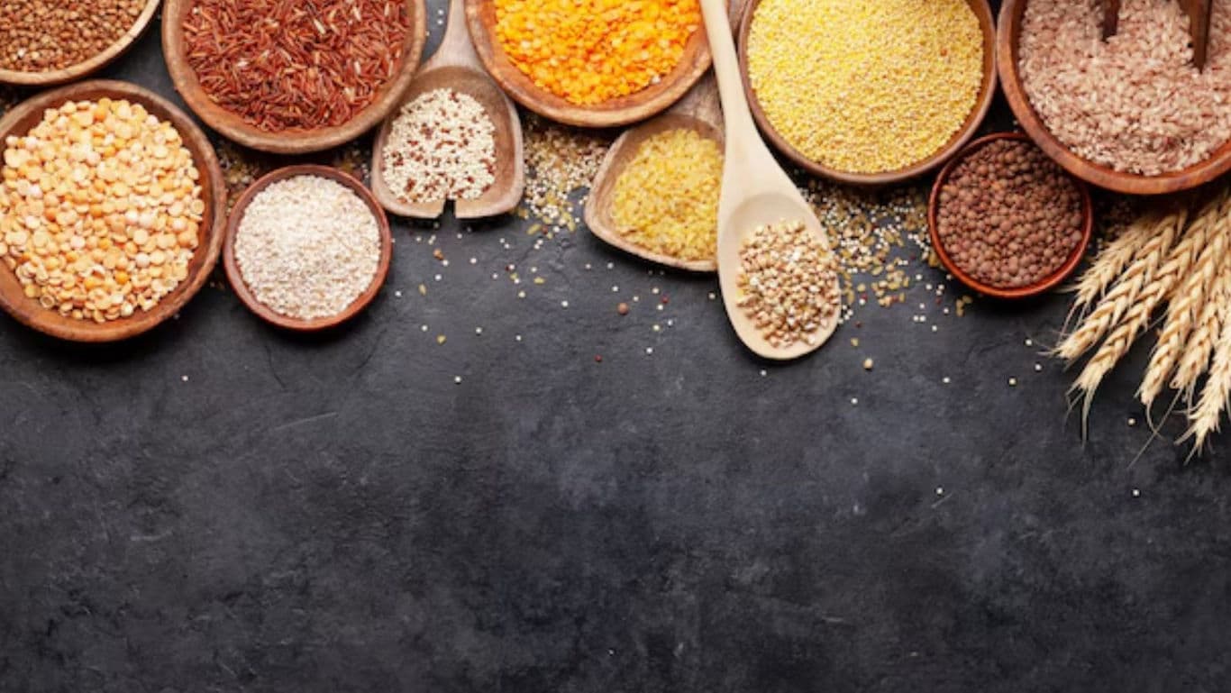 Assorted Whole Grains and Cereals in Wooden Bowls