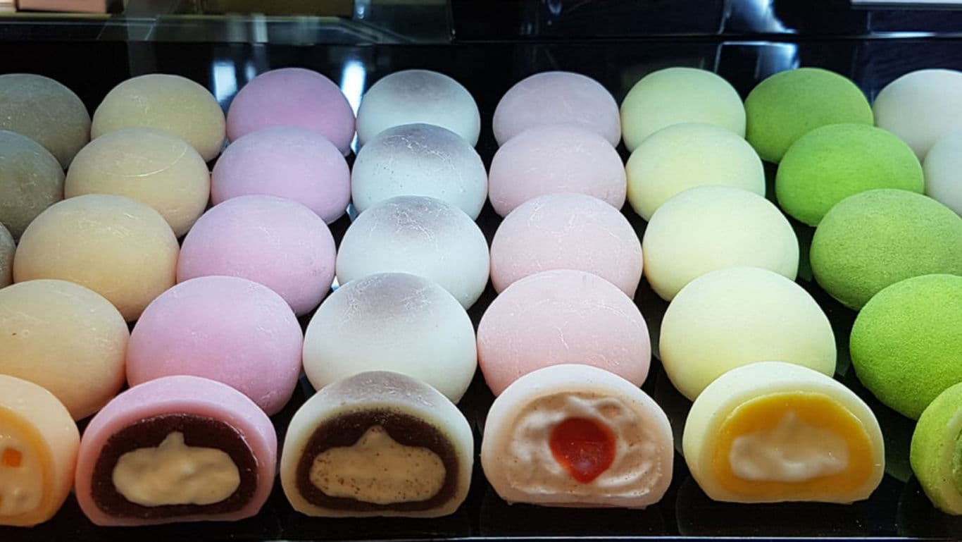 Assorted mochi ice cream balls in display case
