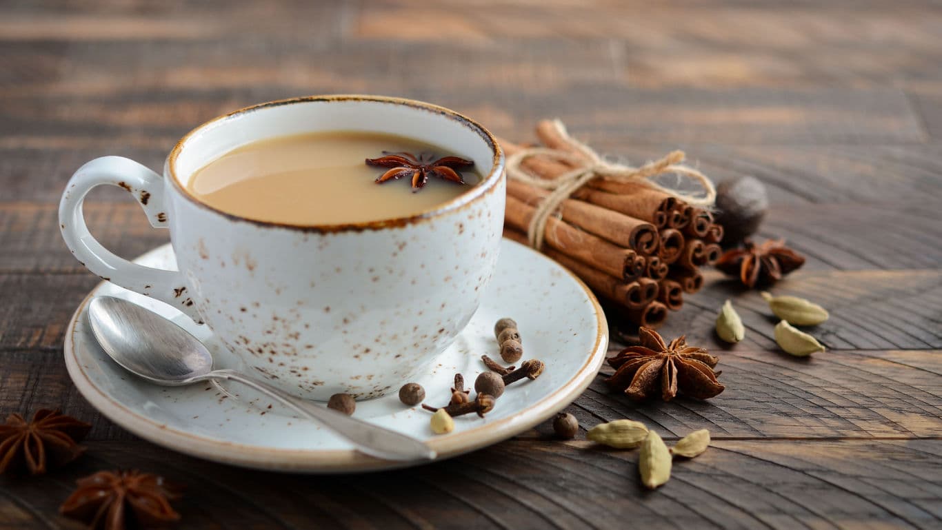 Spiced chai latte in rustic ceramic cup