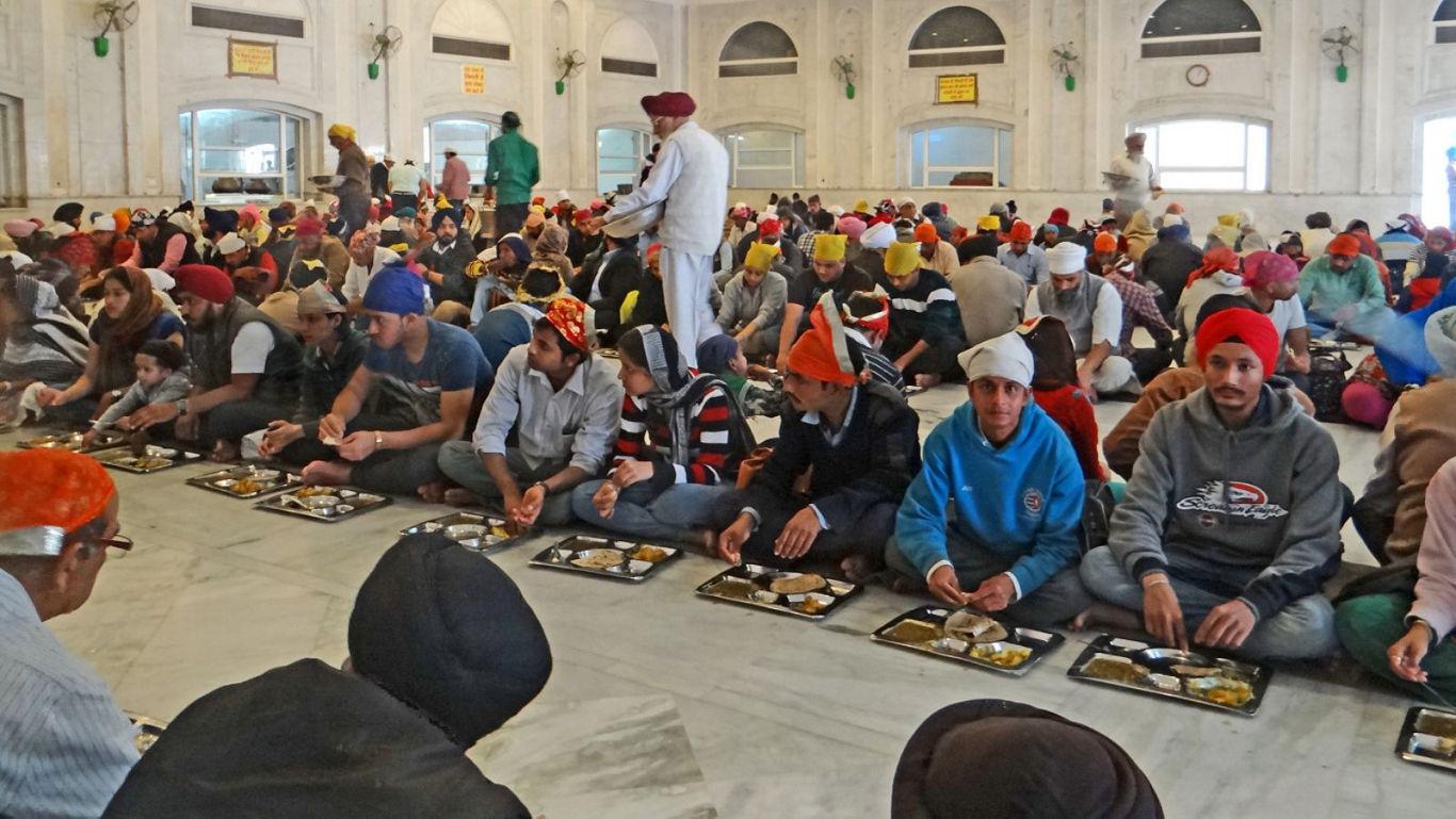 Community meal gathering in Sikh temple