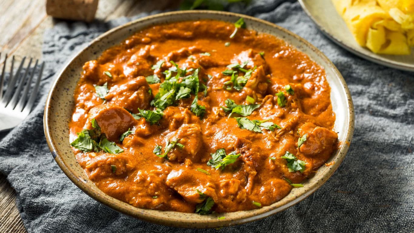 Creamy curry dish with fresh herbs