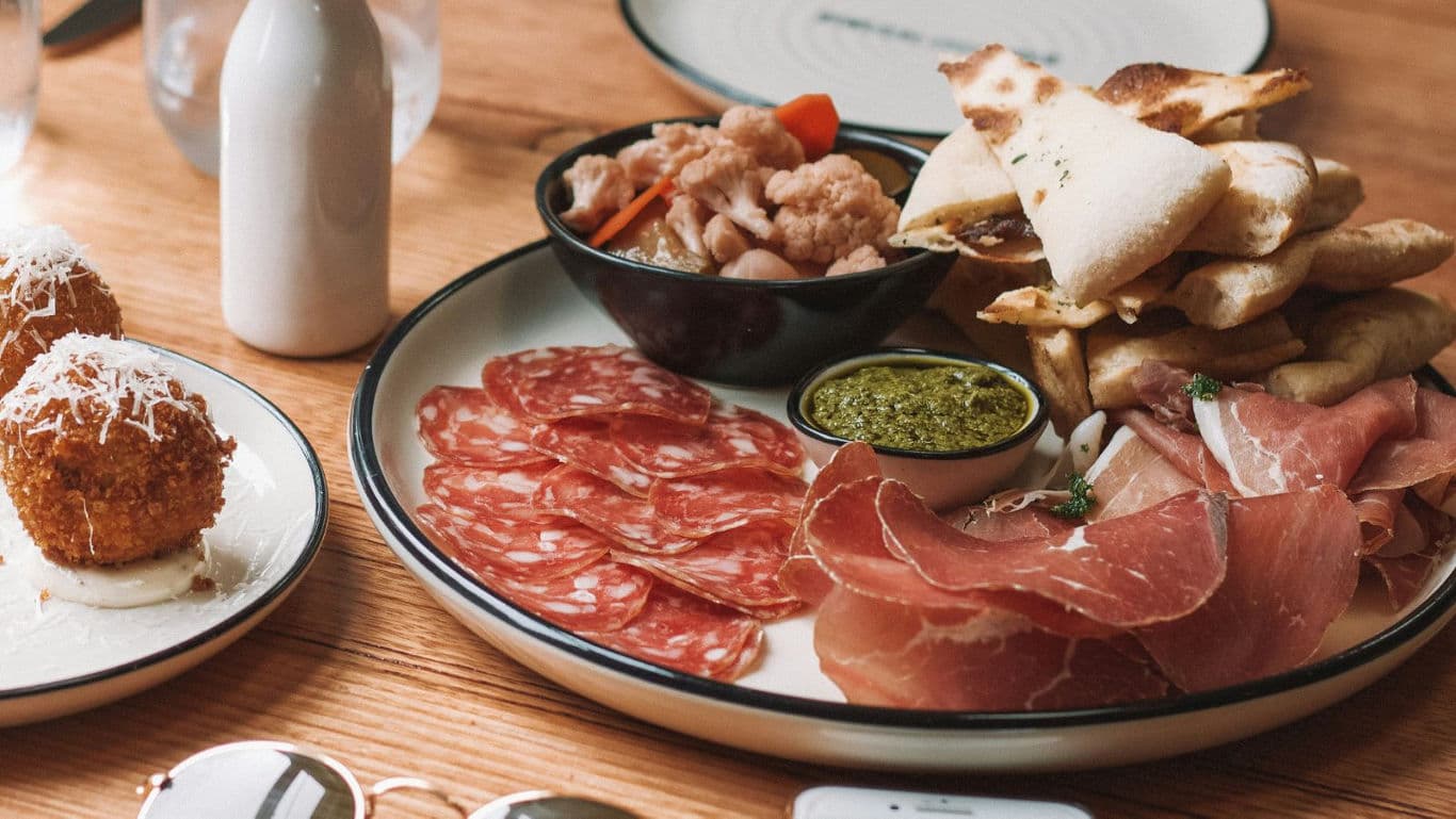 Italian charcuterie platter with cured meats and bread