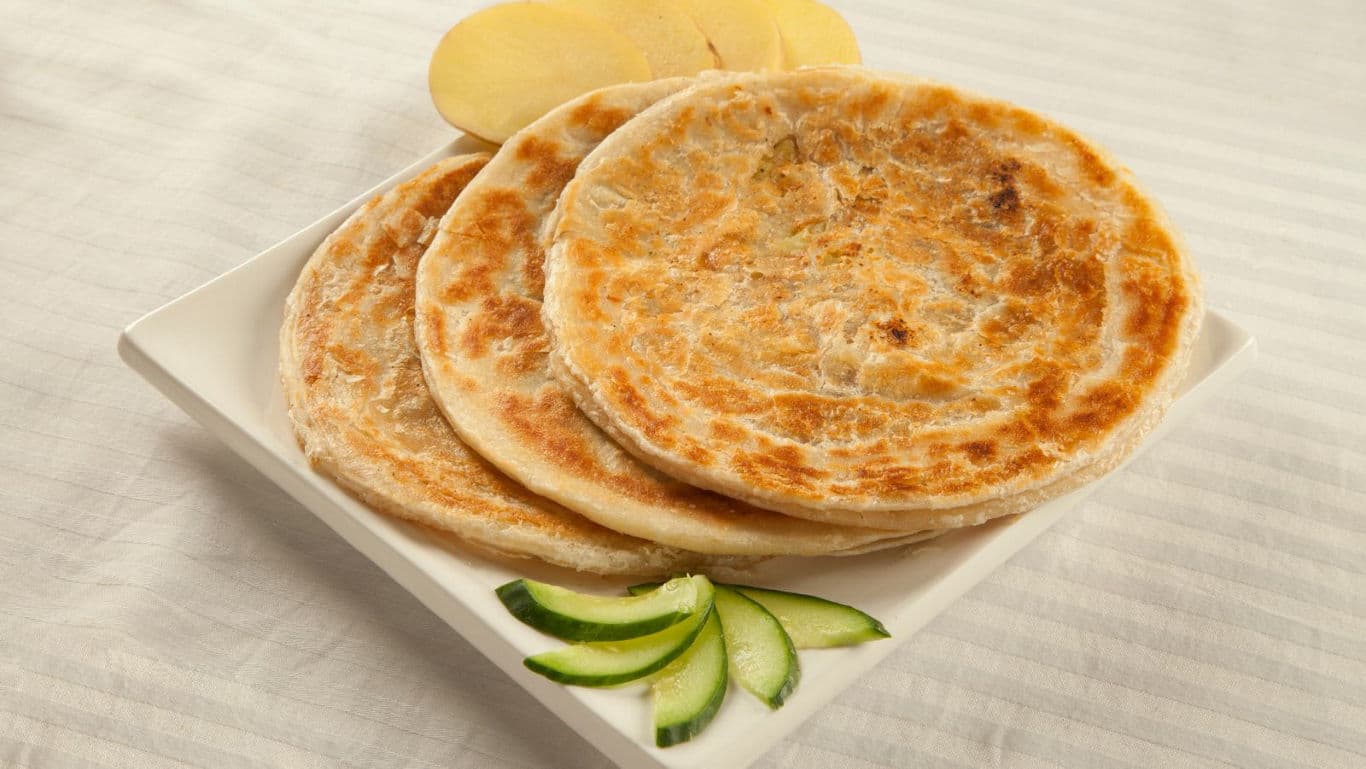 Crispy flatbreads served on white plate