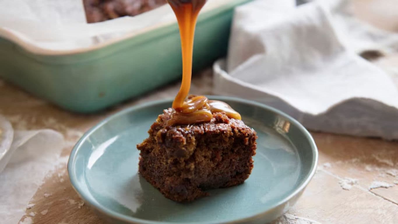 Sticky toffee pudding with caramel sauce drizzle