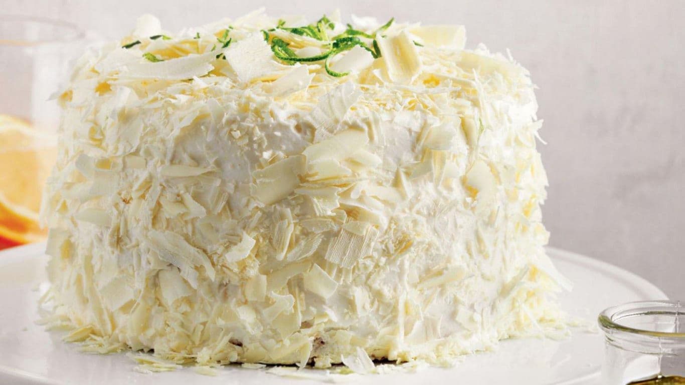 White chocolate cake with lime garnish