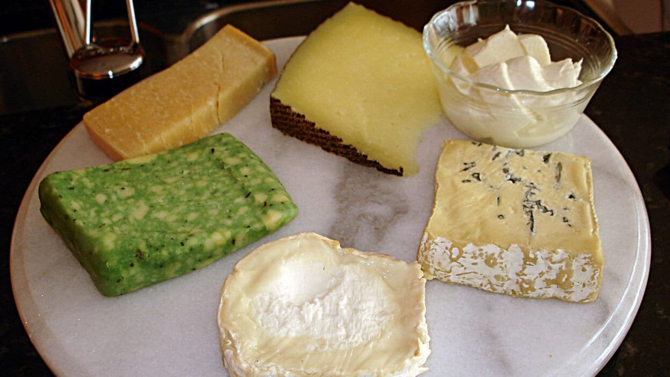 Assorted Cheese Selection on Marble Platter