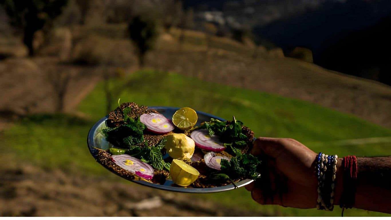 Traditional food platter with lemon outdoors
