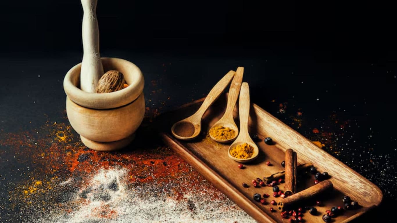 Wooden spice tools with vibrant powders