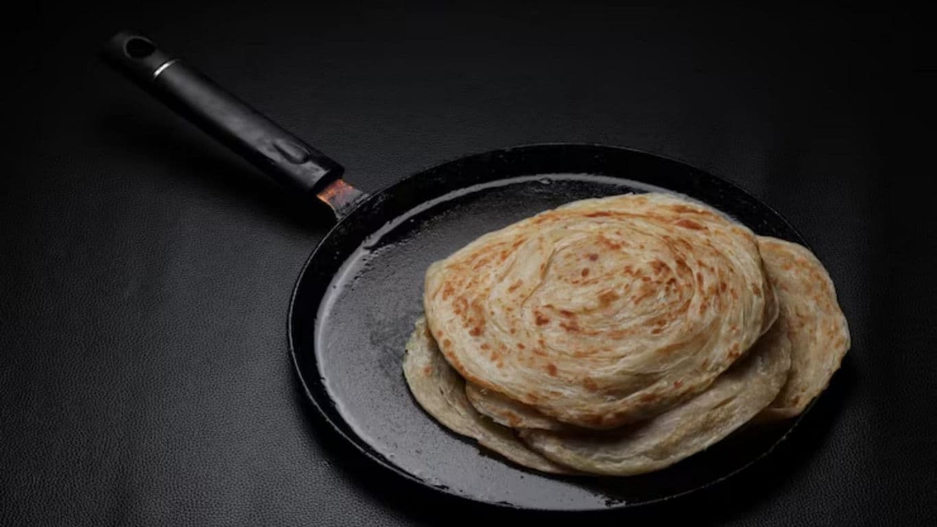 Layered flatbread on a black skillet