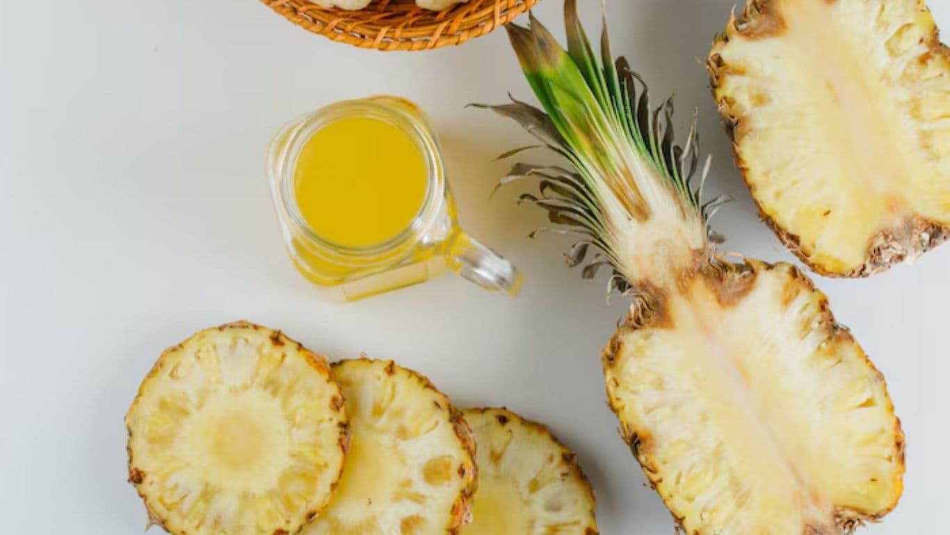 Fresh Pineapple Slices and Juice Display