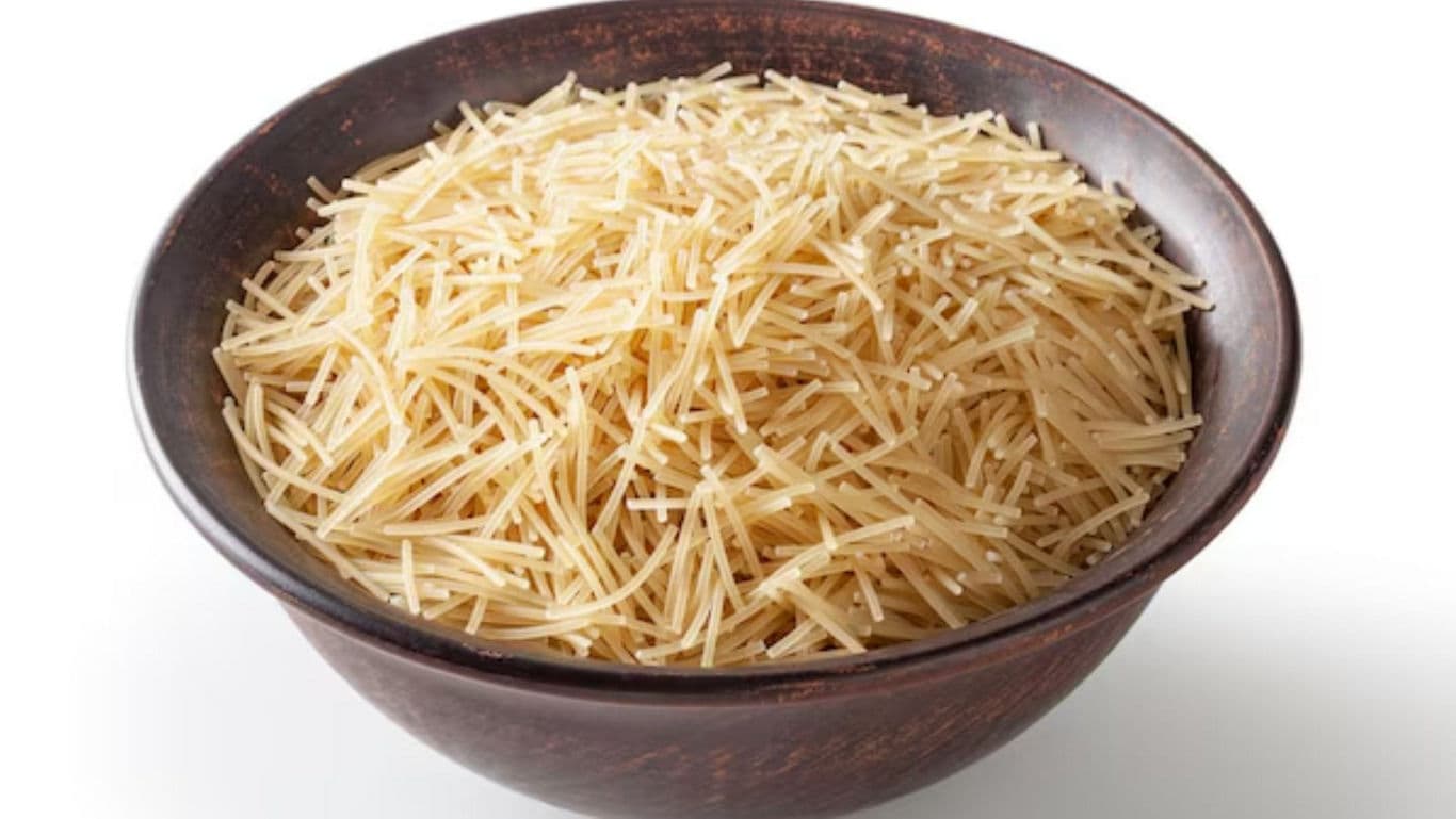 Dry Vermicelli Noodles in Wooden Bowl on White