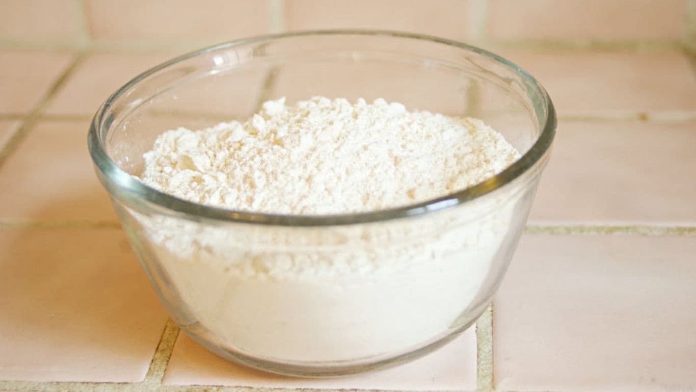 Glass bowl filled with white flour