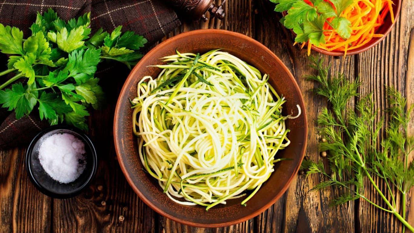 Zoodles in a bowl with carrots