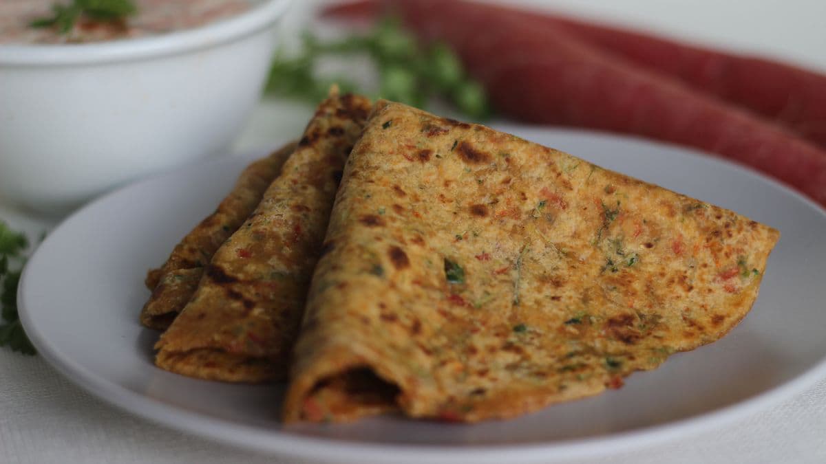khapli wheat zucchini stuffed paratha pile