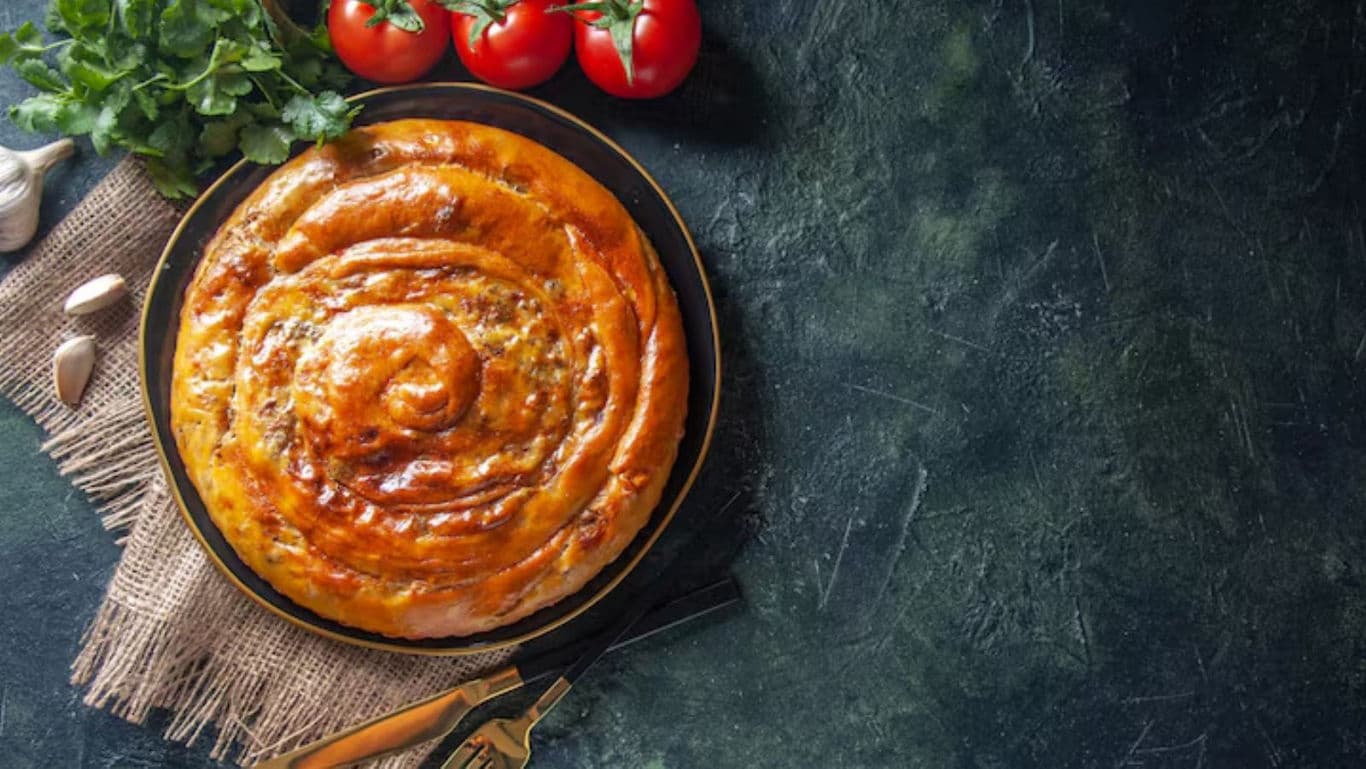 Golden Spiral Pie with Fresh Tomatoes and Herbs