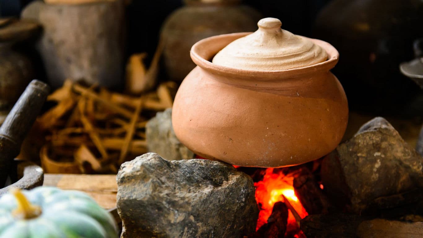 food cooked in a clay pot.