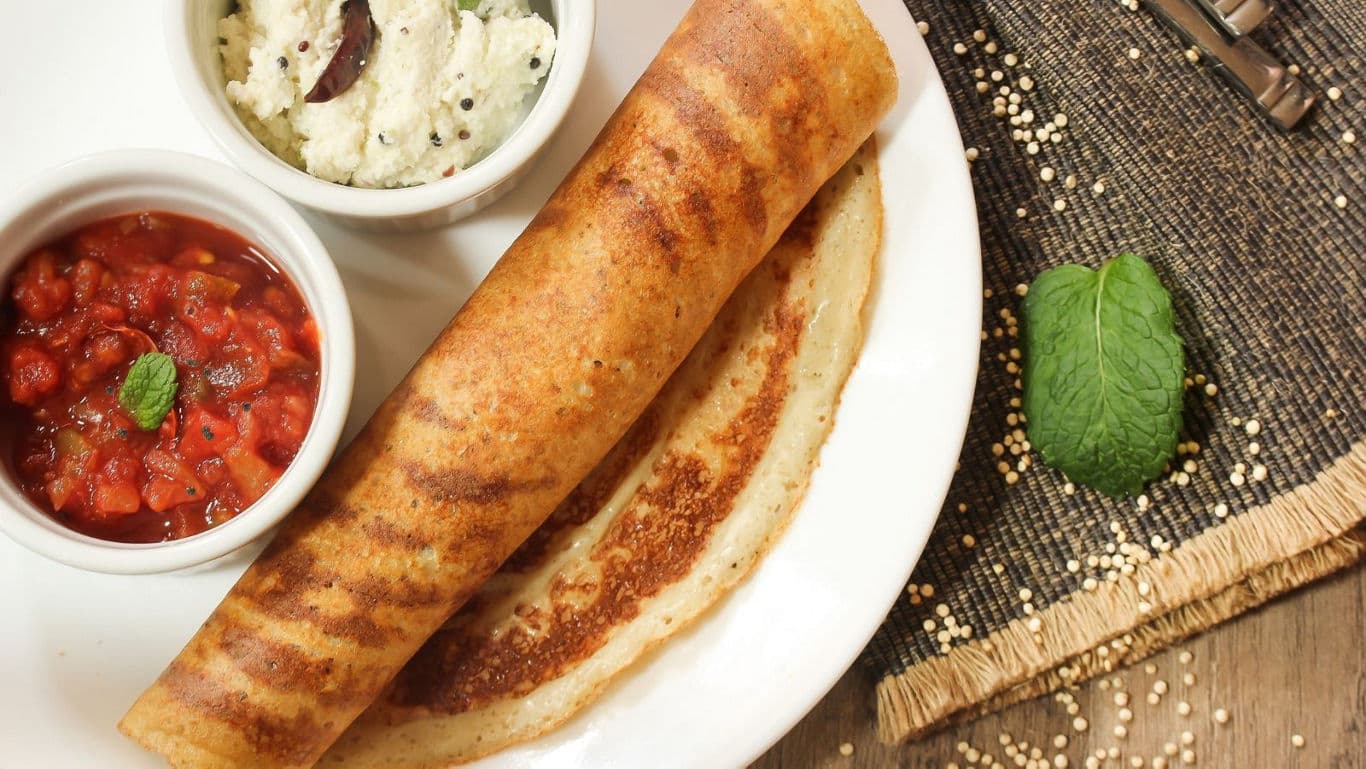 Moong dal dosa with fillings and condiments 
