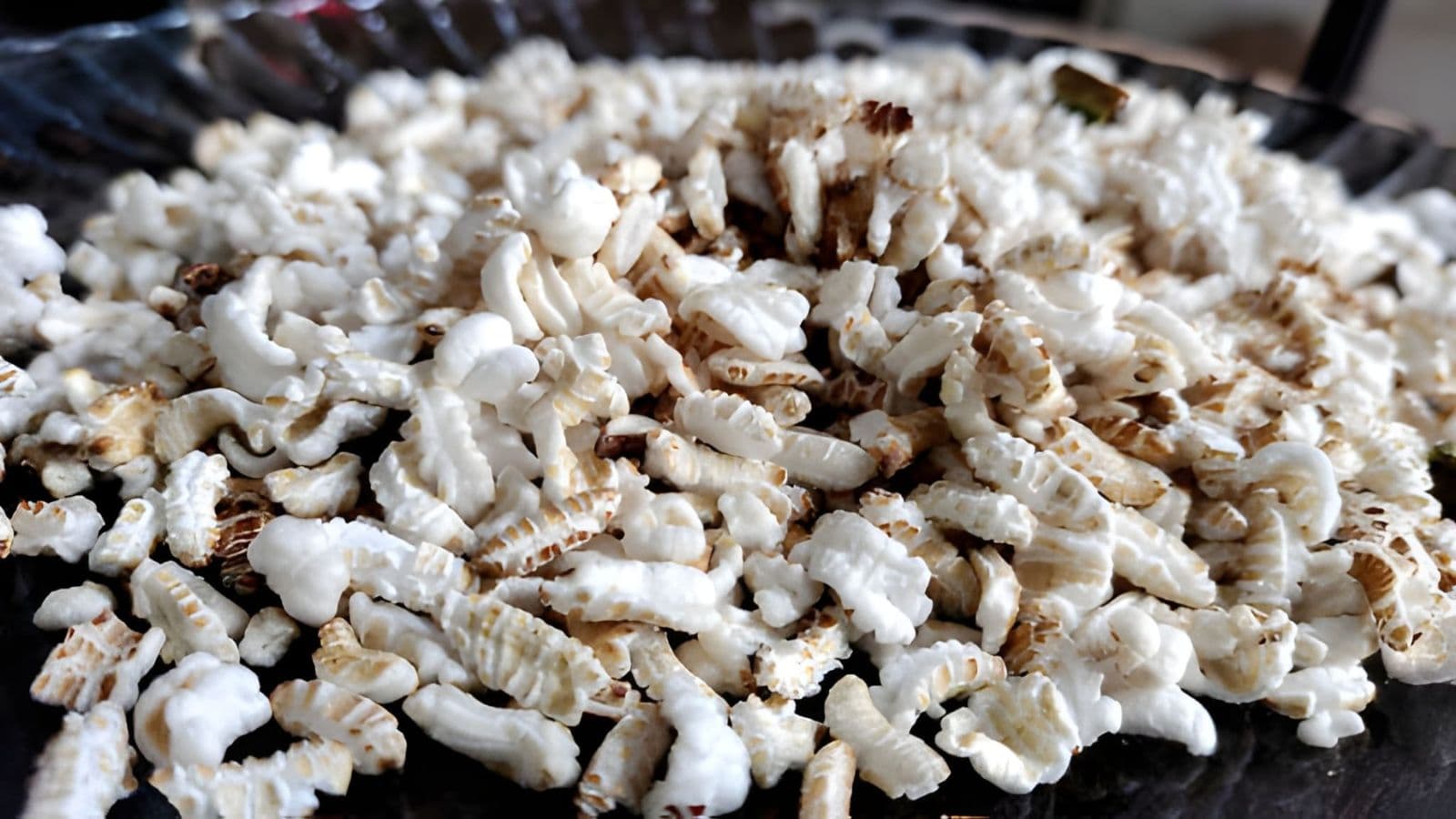 Close-up of puffed edible grains on plate